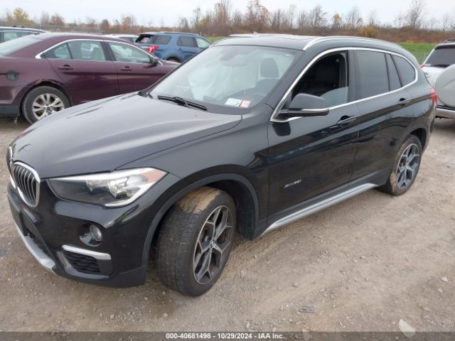 Photo 1 VIN: WBXHT3C31J5F89684 - BMW X1 