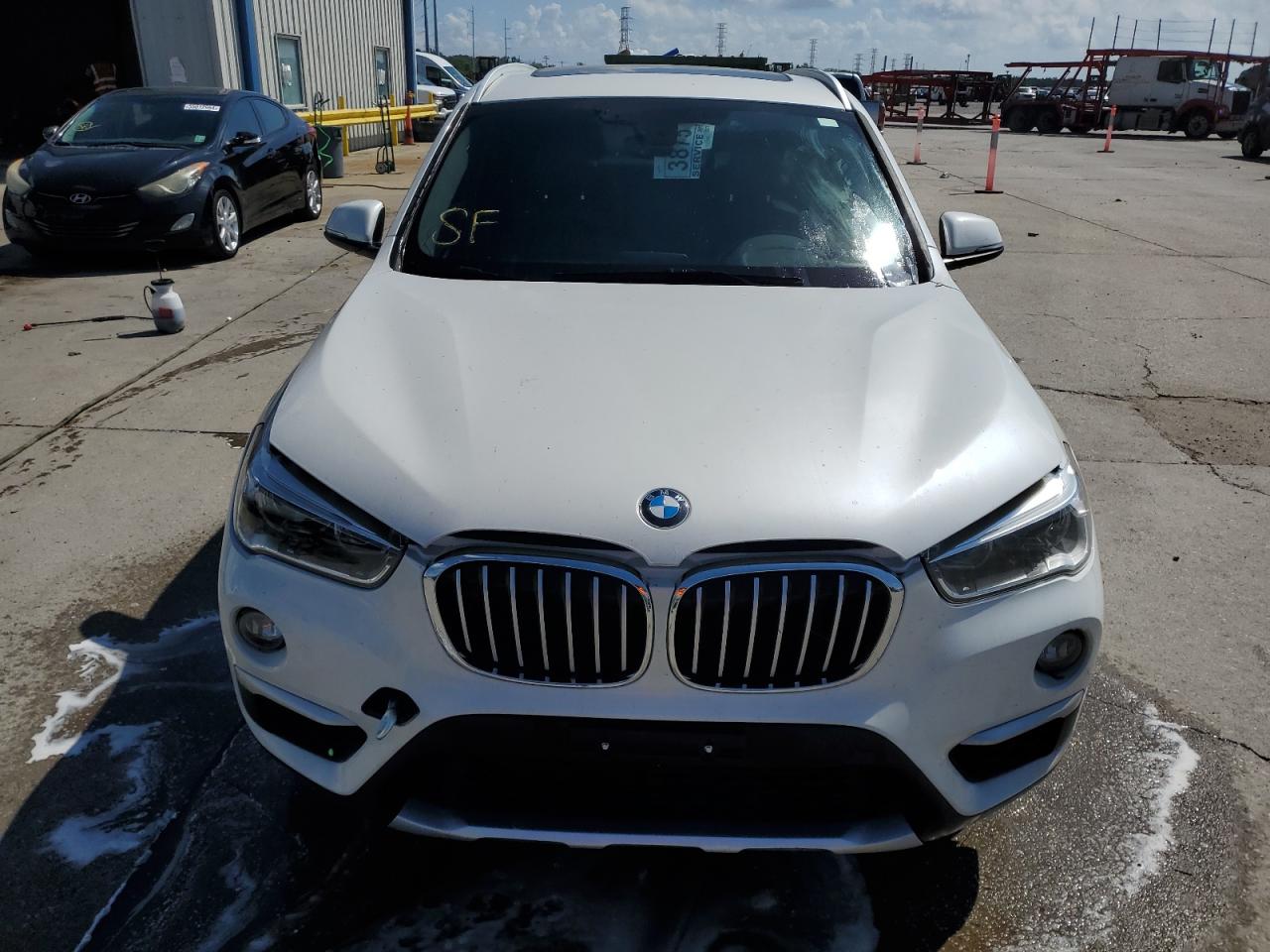 Photo 4 VIN: WBXHT3C31J5F89877 - BMW X1 