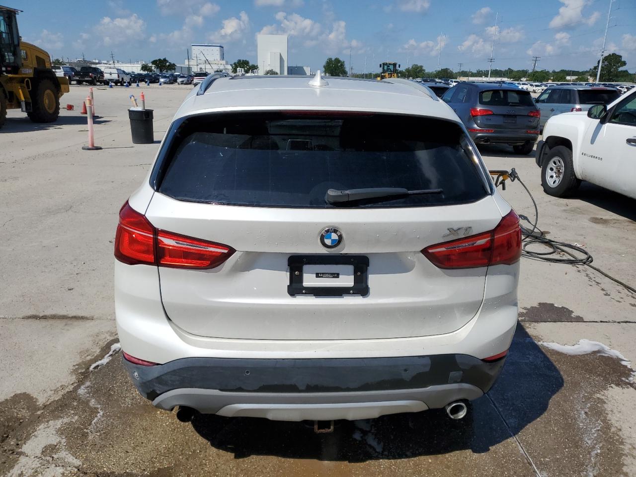 Photo 5 VIN: WBXHT3C31J5F89877 - BMW X1 