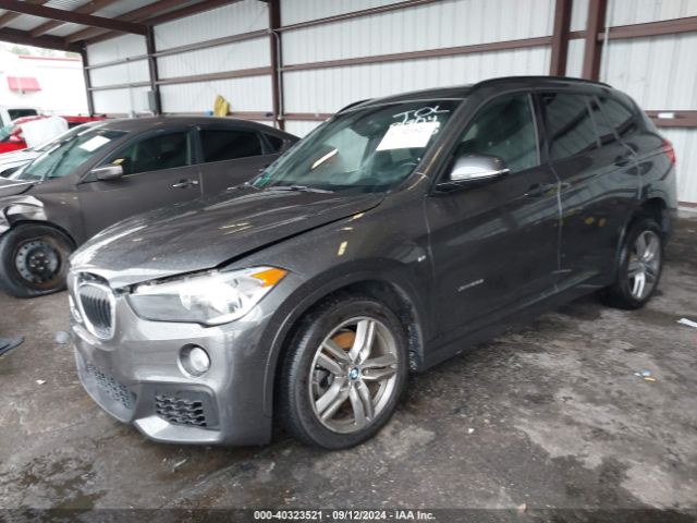 Photo 1 VIN: WBXHT3C31J5F93136 - BMW X1 