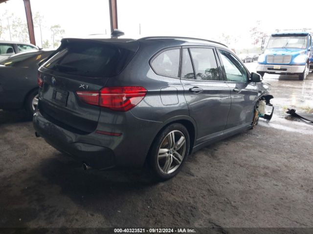 Photo 3 VIN: WBXHT3C31J5F93136 - BMW X1 