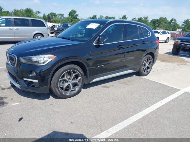 Photo 1 VIN: WBXHT3C31J5K20837 - BMW X1 