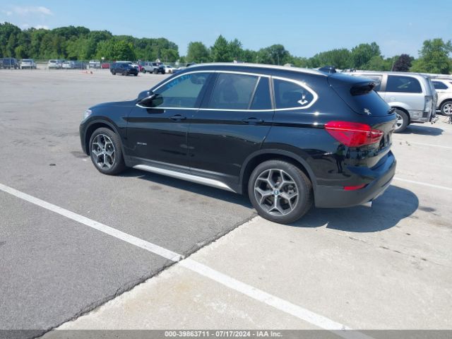 Photo 2 VIN: WBXHT3C31J5K20837 - BMW X1 