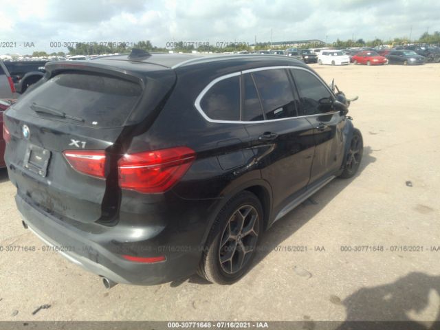 Photo 3 VIN: WBXHT3C31J5K23012 - BMW X1 