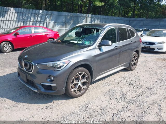 Photo 1 VIN: WBXHT3C31J5L32733 - BMW X1 