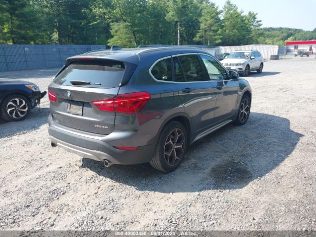 Photo 3 VIN: WBXHT3C31J5L32733 - BMW X1 