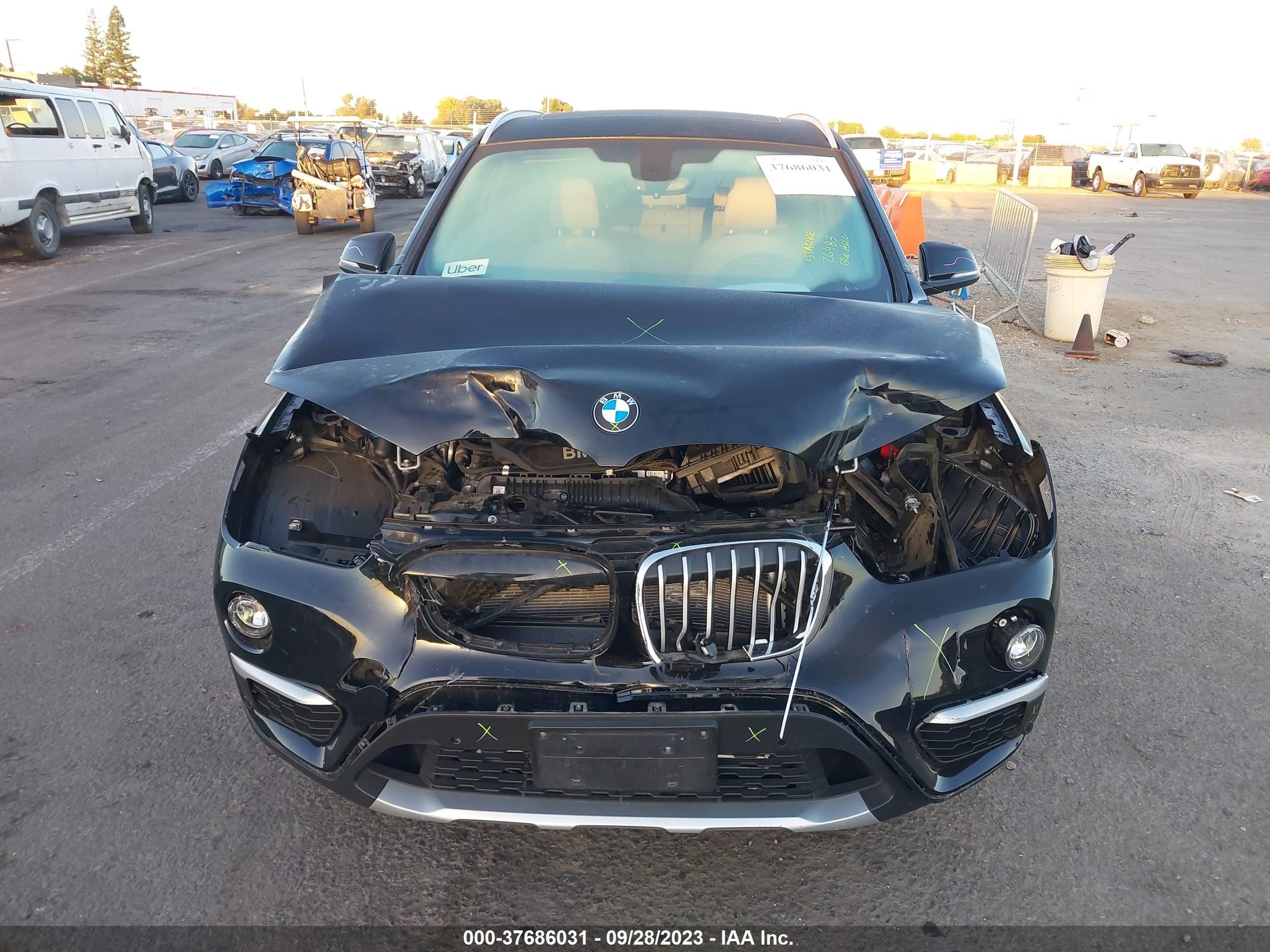 Photo 11 VIN: WBXHT3C31J5L35177 - BMW X1 