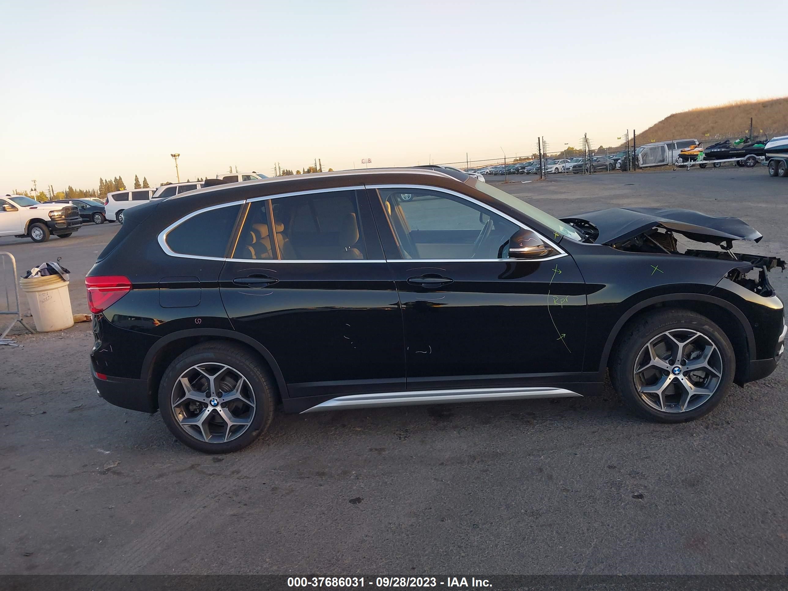 Photo 12 VIN: WBXHT3C31J5L35177 - BMW X1 