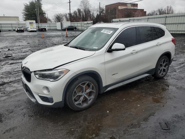 Photo 0 VIN: WBXHT3C32G5E50527 - BMW X1 