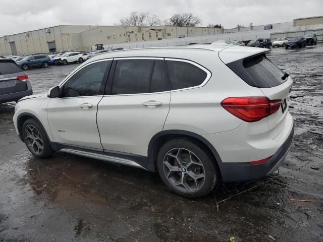 Photo 1 VIN: WBXHT3C32G5E50527 - BMW X1 