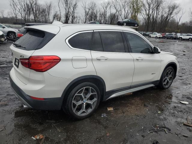 Photo 2 VIN: WBXHT3C32G5E50527 - BMW X1 