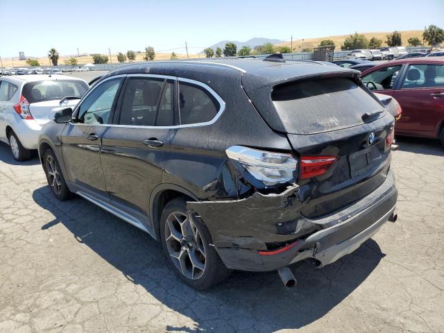 Photo 1 VIN: WBXHT3C32G5E50737 - BMW X1 