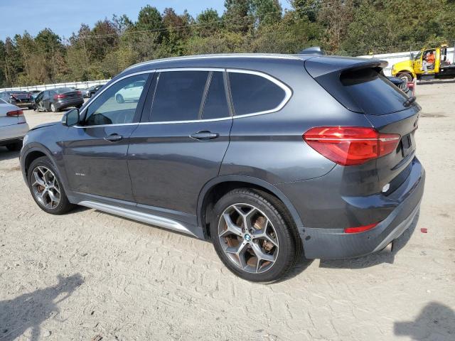 Photo 1 VIN: WBXHT3C32G5E52827 - BMW X1 