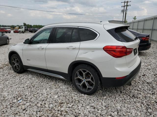 Photo 1 VIN: WBXHT3C32G5E53167 - BMW X1 