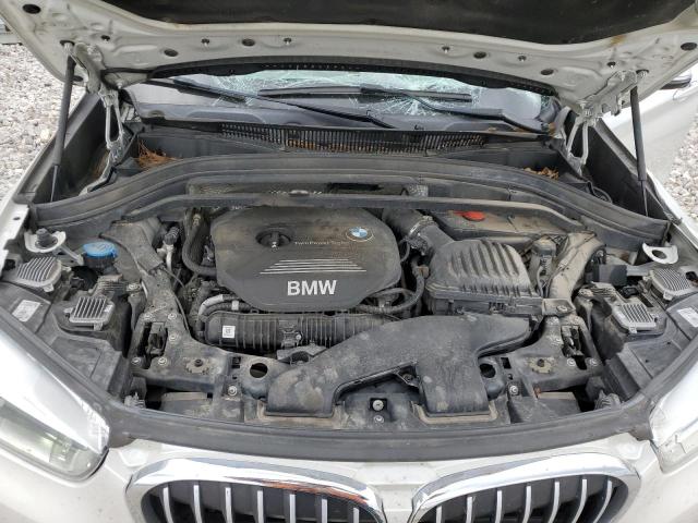 Photo 11 VIN: WBXHT3C32G5E53167 - BMW X1 