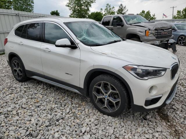 Photo 3 VIN: WBXHT3C32G5E53167 - BMW X1 