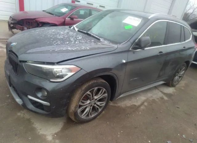 Photo 1 VIN: WBXHT3C32G5E54108 - BMW X1 