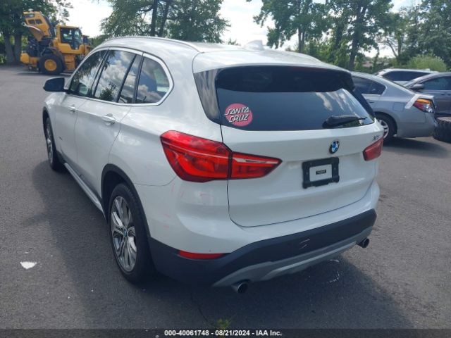 Photo 2 VIN: WBXHT3C32G5E56375 - BMW X1 