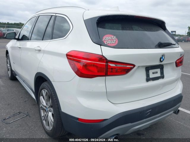 Photo 2 VIN: WBXHT3C32G5E56375 - BMW X1 