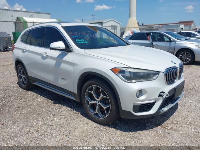 Photo 0 VIN: WBXHT3C32G5F64513 - BMW X1 