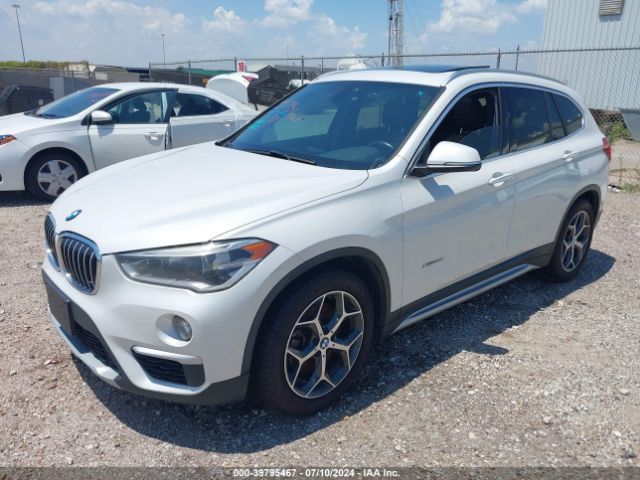 Photo 1 VIN: WBXHT3C32G5F64513 - BMW X1 