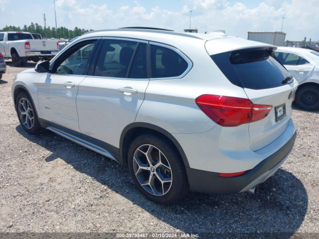 Photo 2 VIN: WBXHT3C32G5F64513 - BMW X1 