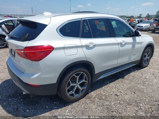 Photo 3 VIN: WBXHT3C32G5F64513 - BMW X1 