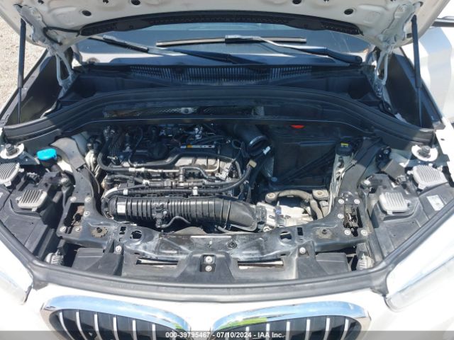 Photo 9 VIN: WBXHT3C32G5F64513 - BMW X1 