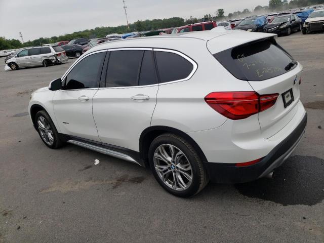 Photo 1 VIN: WBXHT3C32G5F66309 - BMW X1 