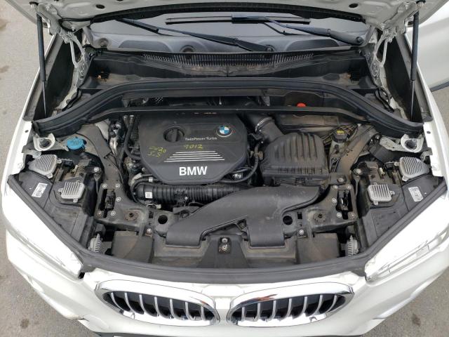 Photo 11 VIN: WBXHT3C32G5F66309 - BMW X1 