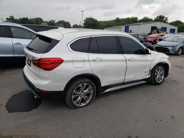 Photo 2 VIN: WBXHT3C32G5F66309 - BMW X1 