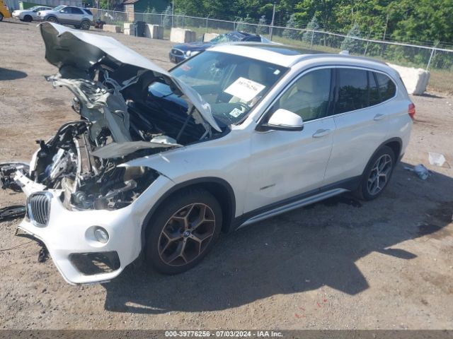 Photo 1 VIN: WBXHT3C32G5F67637 - BMW X1 