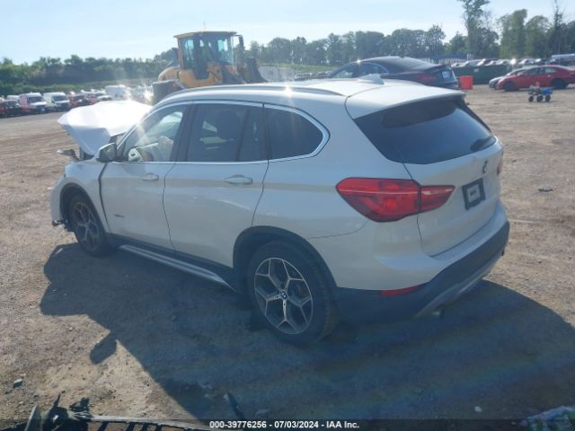 Photo 2 VIN: WBXHT3C32G5F67637 - BMW X1 