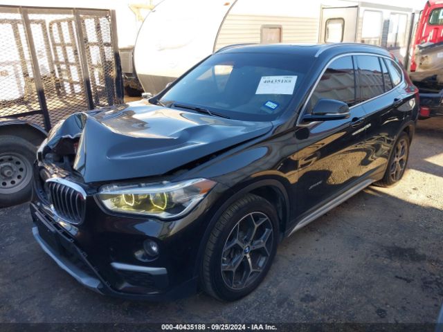 Photo 1 VIN: WBXHT3C32GP884531 - BMW X1 