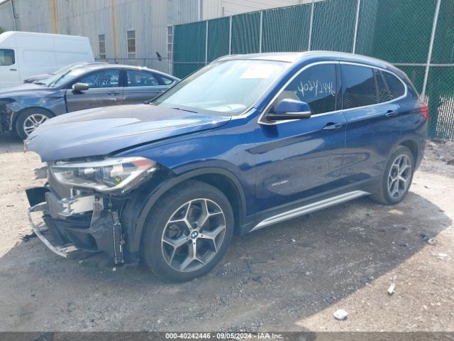 Photo 1 VIN: WBXHT3C32GP888501 - BMW X1 