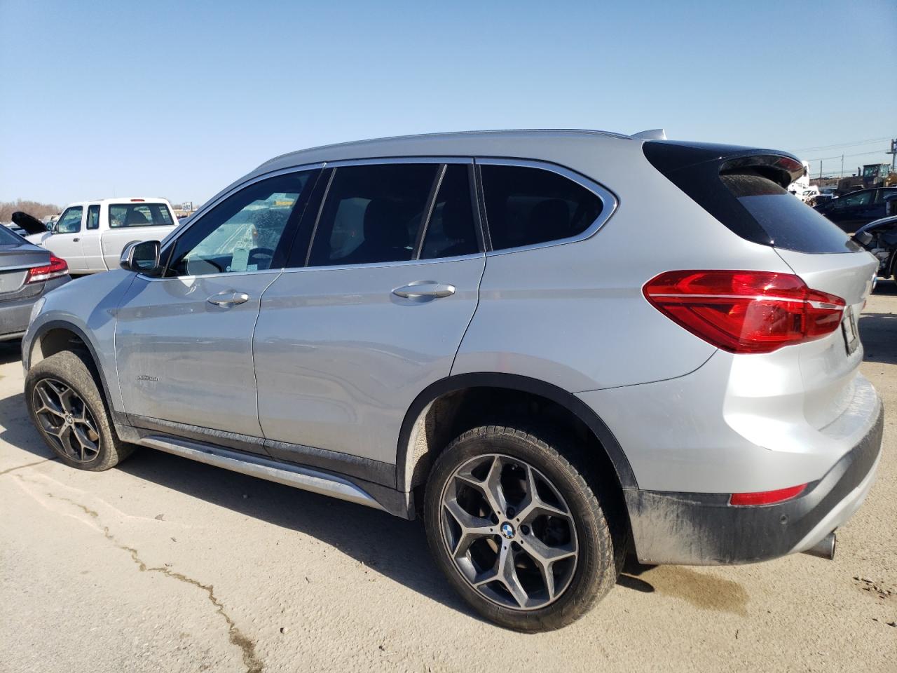 Photo 1 VIN: WBXHT3C32H5F69485 - BMW X1 