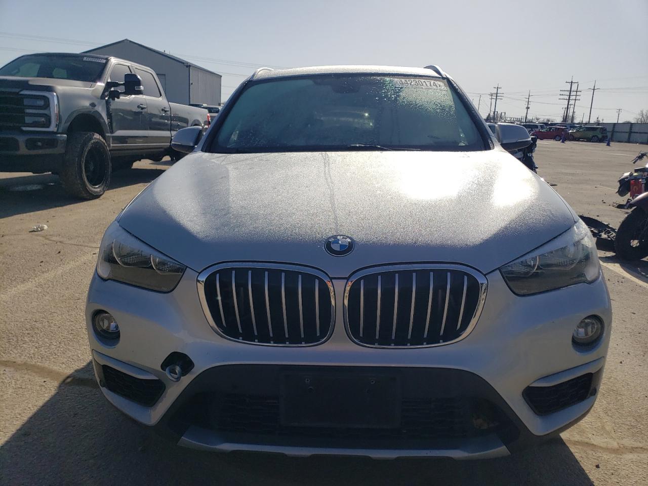 Photo 4 VIN: WBXHT3C32H5F69485 - BMW X1 