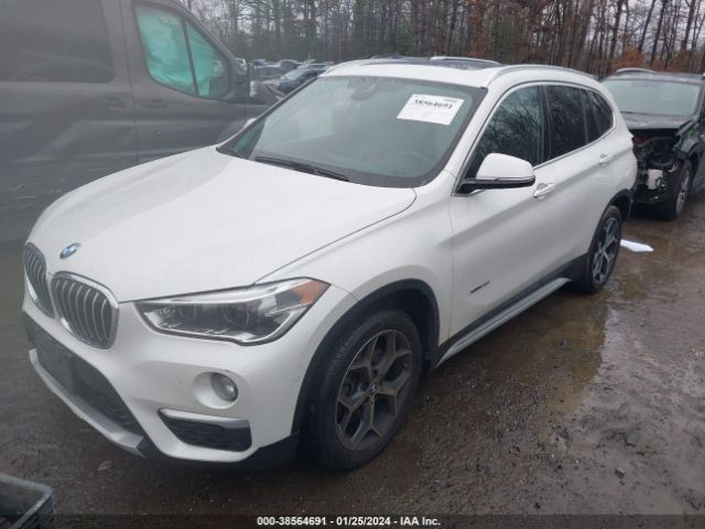 Photo 1 VIN: WBXHT3C32H5F73083 - BMW X1 