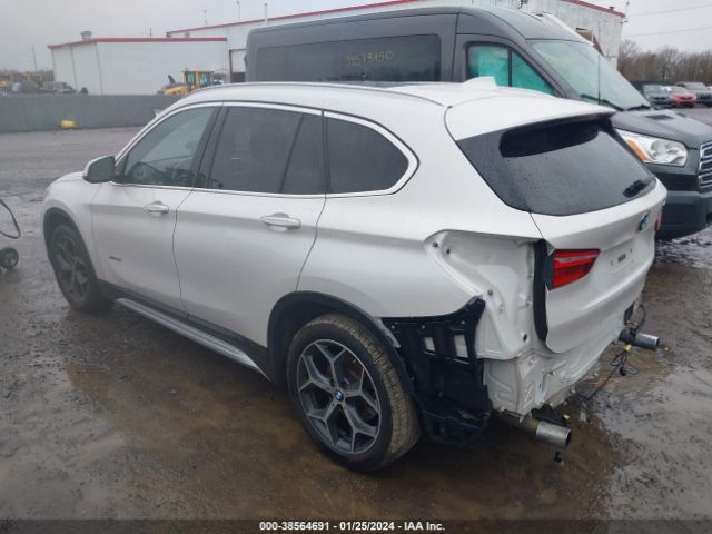 Photo 2 VIN: WBXHT3C32H5F73083 - BMW X1 