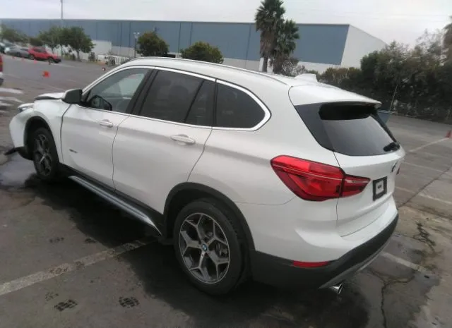 Photo 2 VIN: WBXHT3C32H5F78090 - BMW X1 