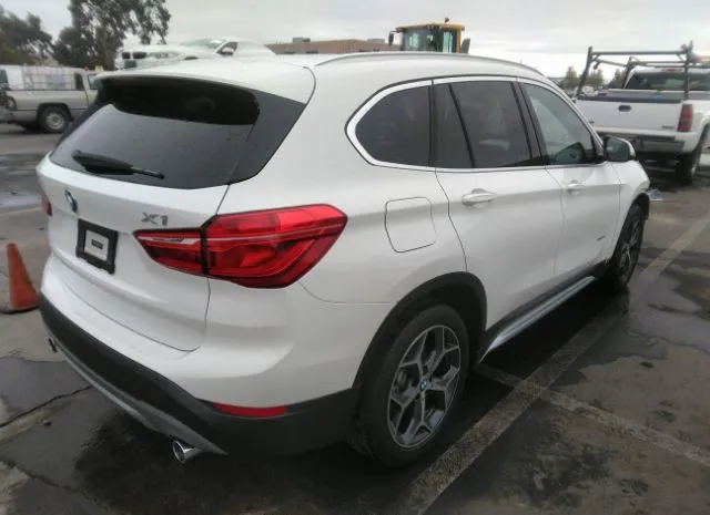 Photo 3 VIN: WBXHT3C32H5F78090 - BMW X1 