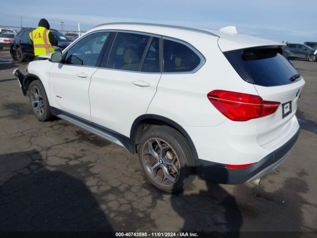 Photo 2 VIN: WBXHT3C32H5F84164 - BMW X1 