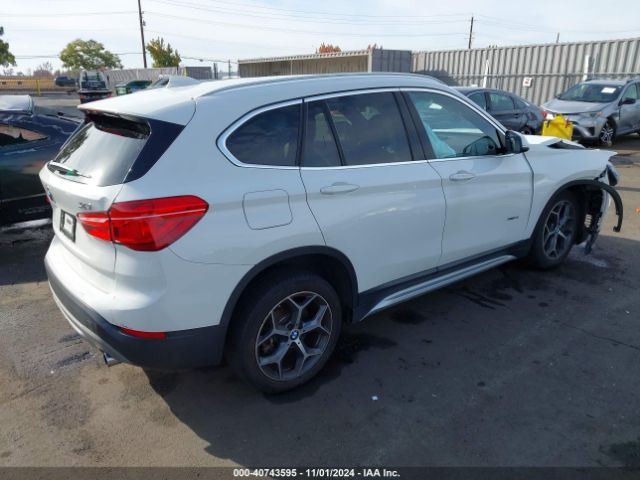 Photo 3 VIN: WBXHT3C32H5F84164 - BMW X1 