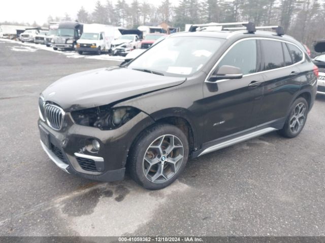 Photo 1 VIN: WBXHT3C32H5F85637 - BMW X1 