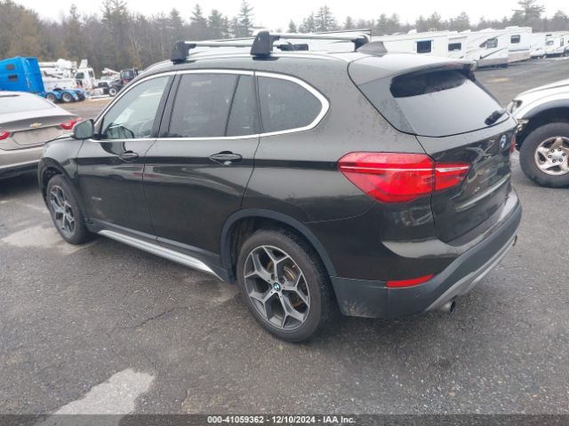 Photo 2 VIN: WBXHT3C32H5F85637 - BMW X1 