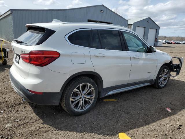 Photo 2 VIN: WBXHT3C32H5F86044 - BMW X1 