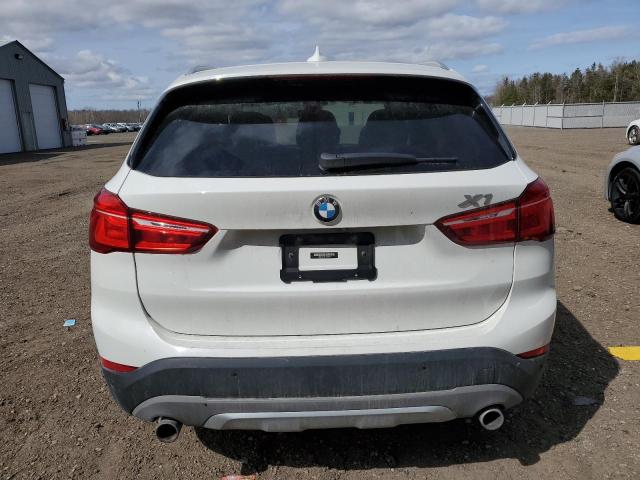 Photo 5 VIN: WBXHT3C32H5F86044 - BMW X1 