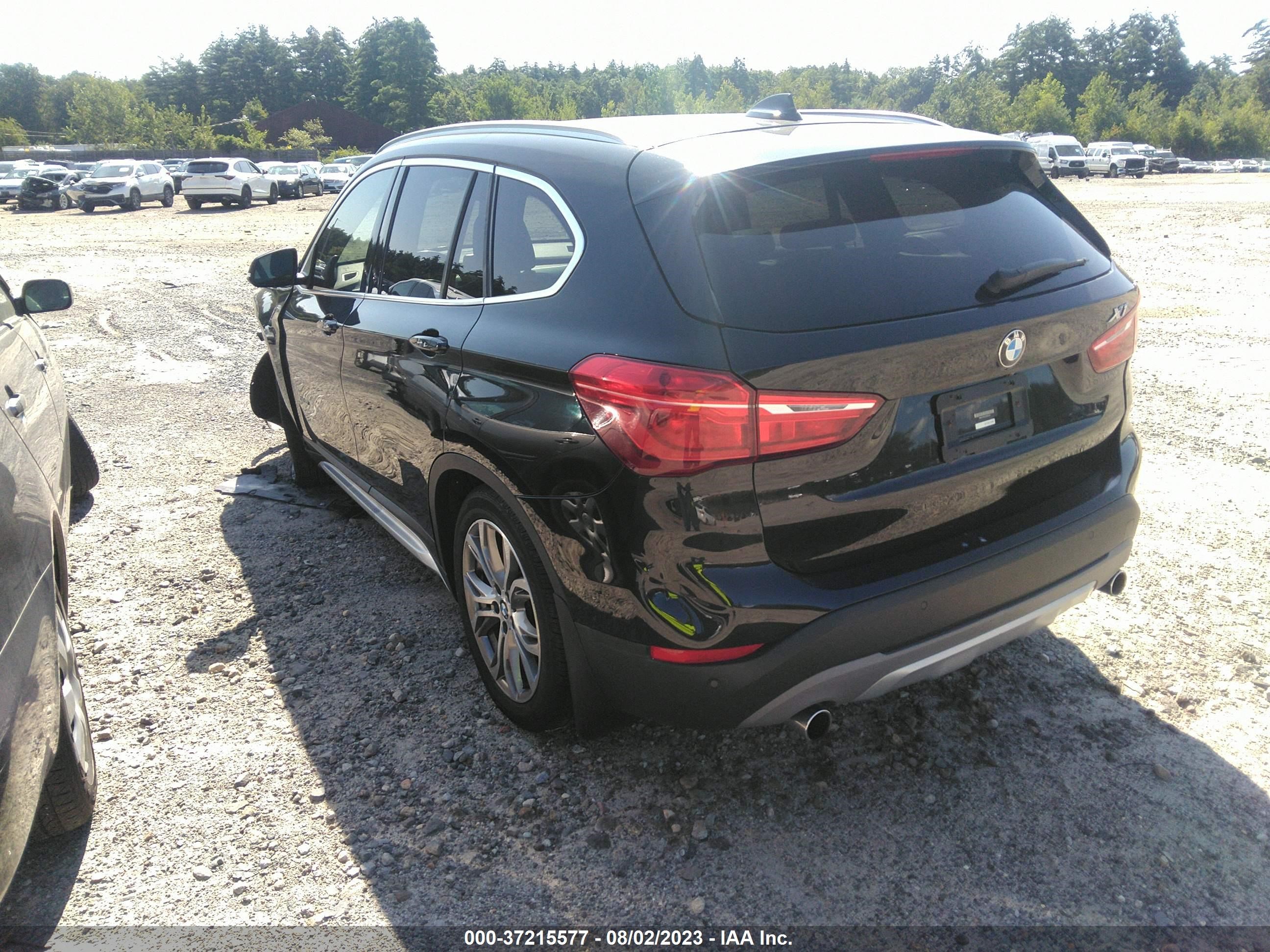 Photo 2 VIN: WBXHT3C32J5F92030 - BMW X1 