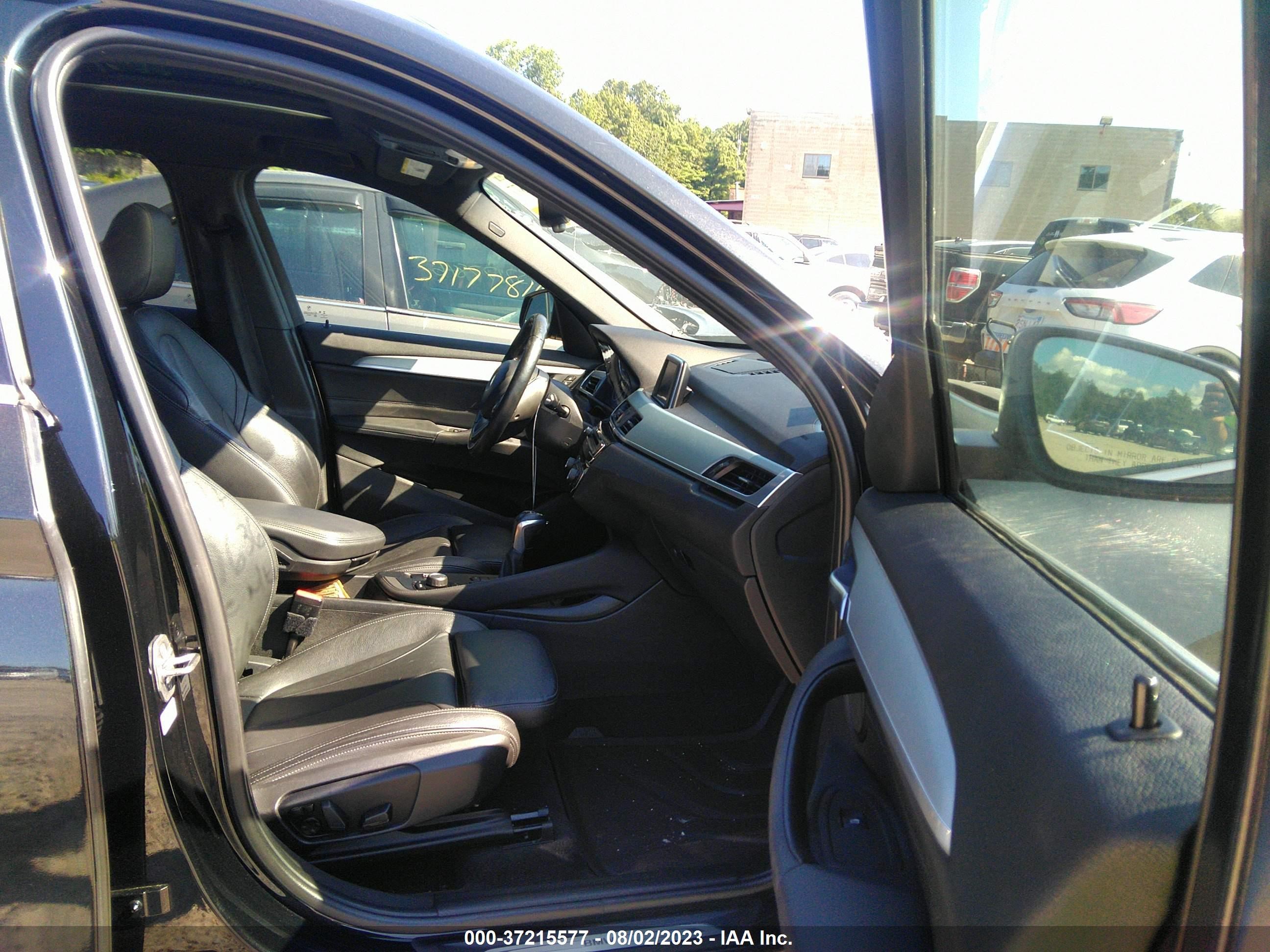 Photo 4 VIN: WBXHT3C32J5F92030 - BMW X1 