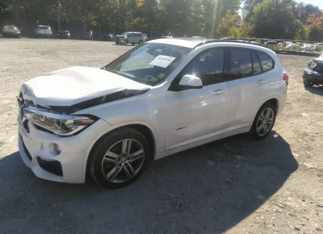 Photo 1 VIN: WBXHT3C32J5K20961 - BMW X1 